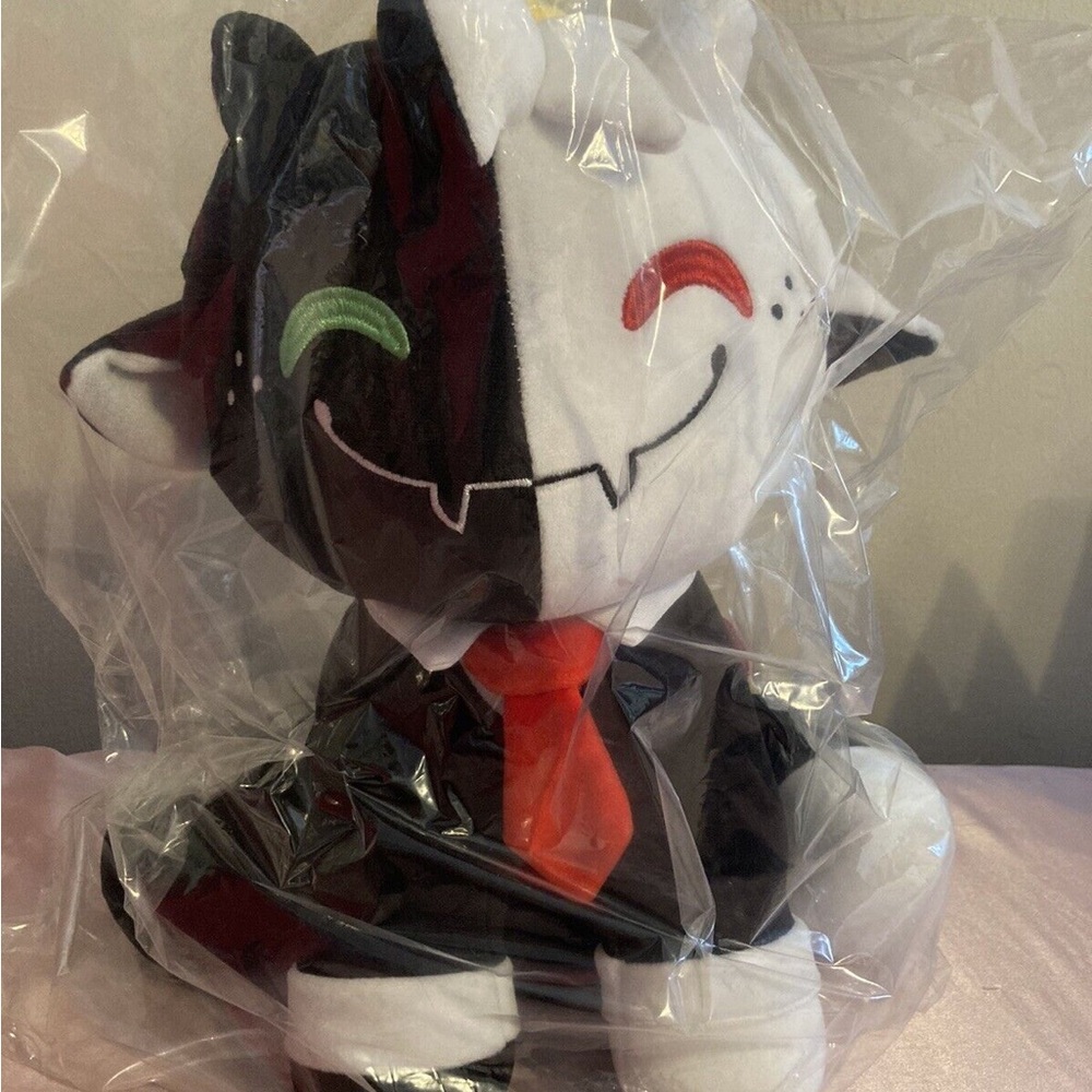 YouTooz Ranbow Sit Plush Collectible item.